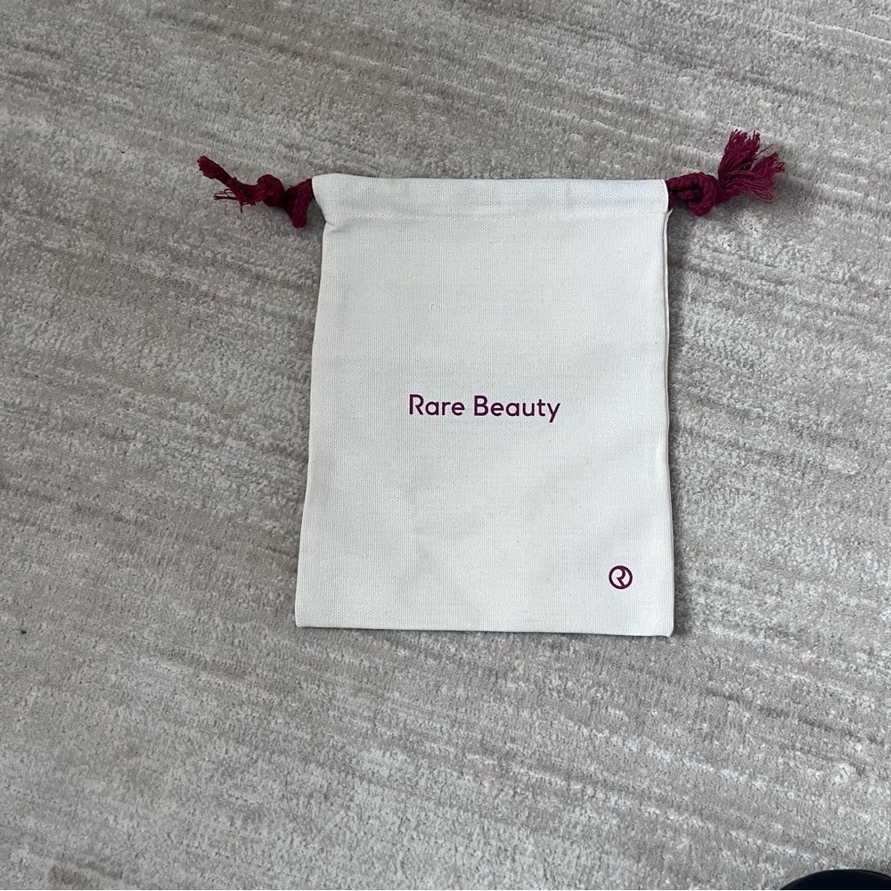 NWOT Rare Beauty Cream Canvas Pouch with Burgundy Drawstrings